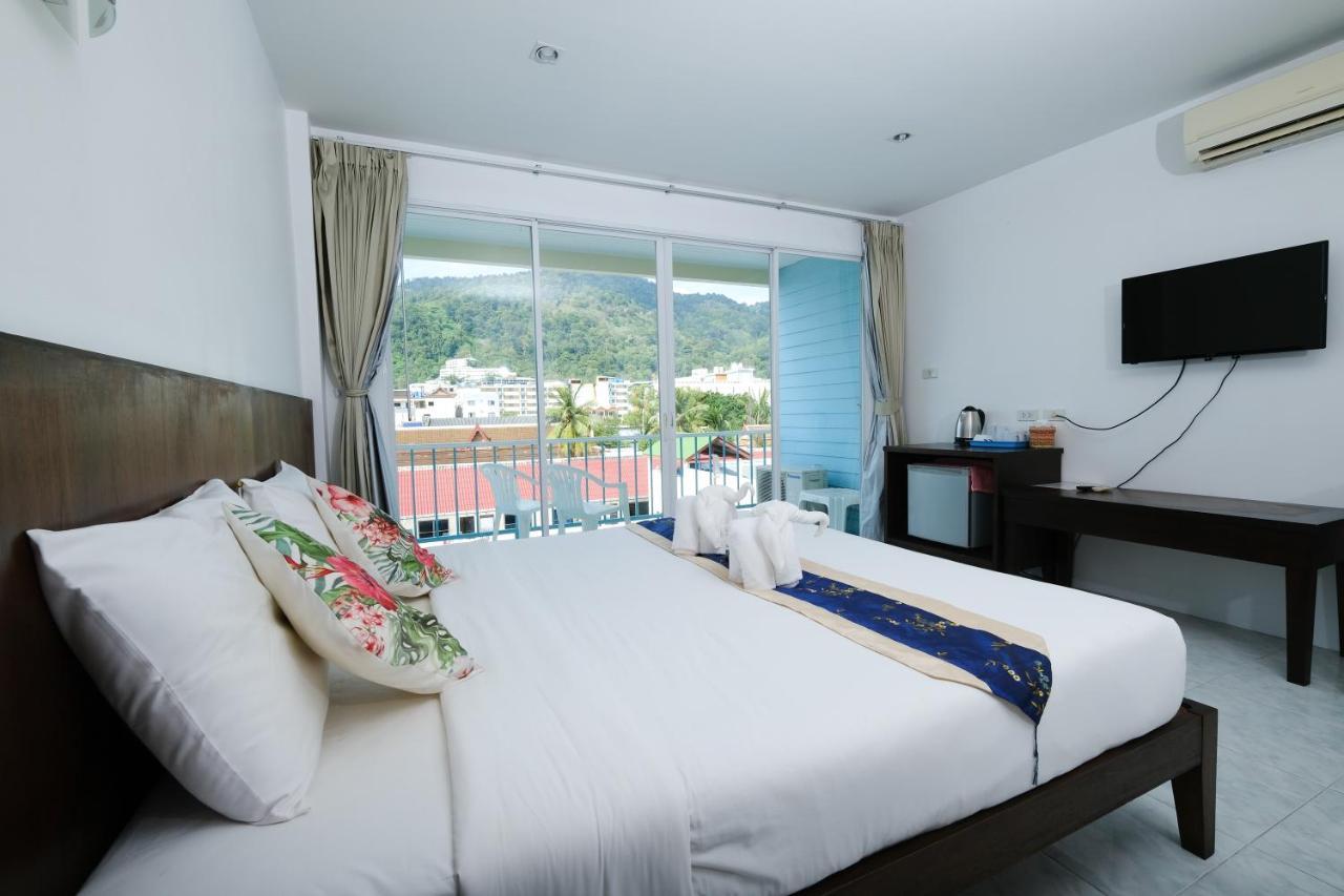 Kiwi Boutique Hotel Patong Exterior foto