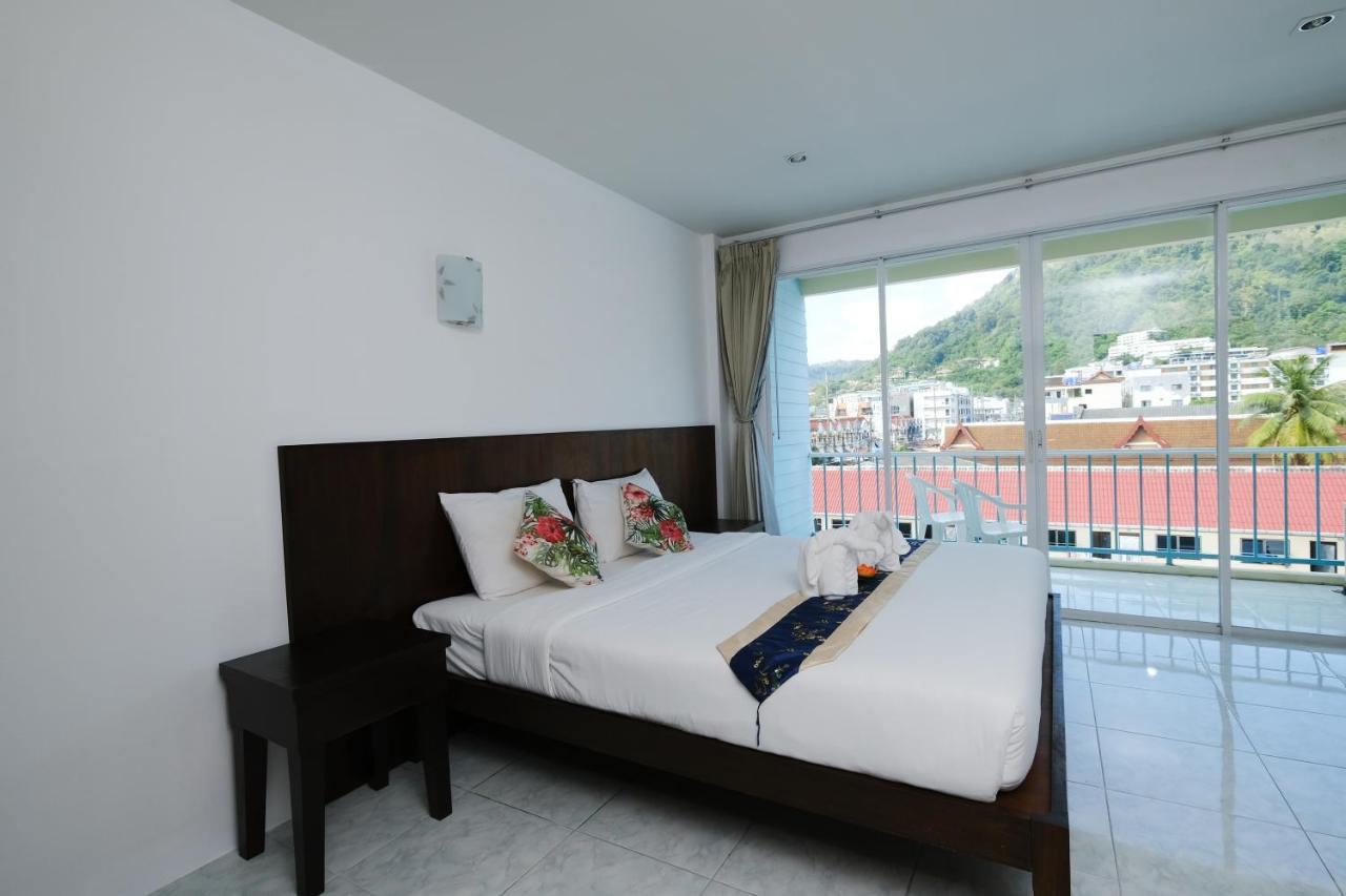 Kiwi Boutique Hotel Patong Exterior foto