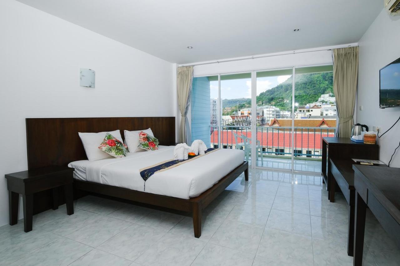 Kiwi Boutique Hotel Patong Exterior foto